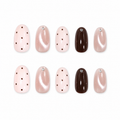 Pink Polka Dot Cat-Eye Press-On Nails on a pure white background, front view