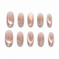 Champagne Crystal Cat-Eye Press-On Nails on a pure white background, front view